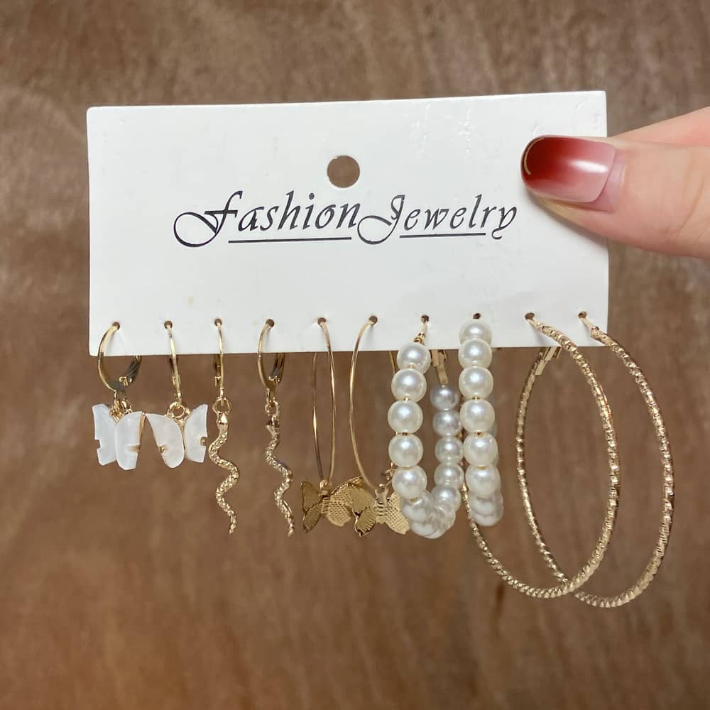 Gold earring set with butterfly drops and hoops